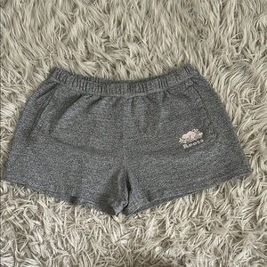 Roots Women's grey comfy sweat-shorts with pink Roots logo on front